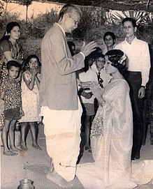 The Sacristan of St.Lawrence Church Moodubelle gives blessings to his grandaughter Salvador_Barboza Circa 1975